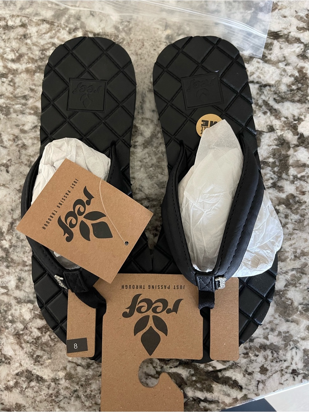 Reef women’s flip flops, new